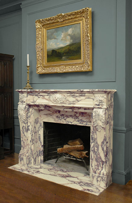 Custom designed fireplace in Calacatta Vagli Rosato