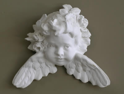 sculpted putto sculpture