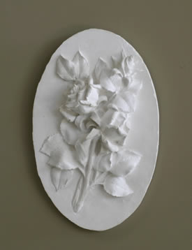 roses sculpted in clay and cast in stone
